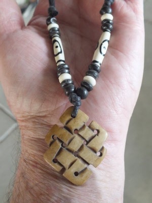 endless love knot on cord pendant