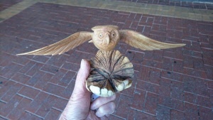 Hand carved owl in flight