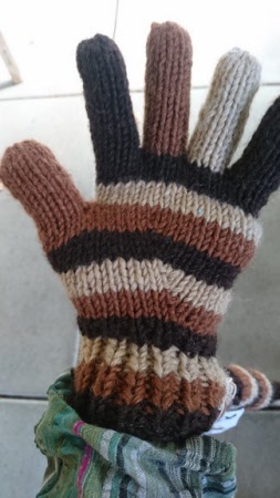 Brown and white gloves