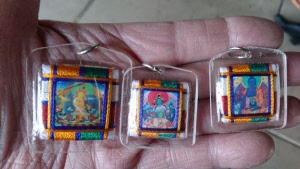 amulets with woven mandala on back