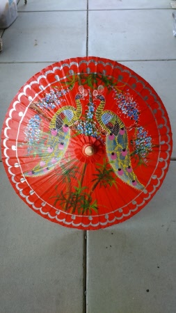 Red Parasol with hand painted Peacocks