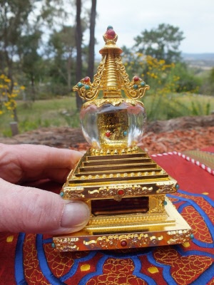 Stupa with prayer wheel inside